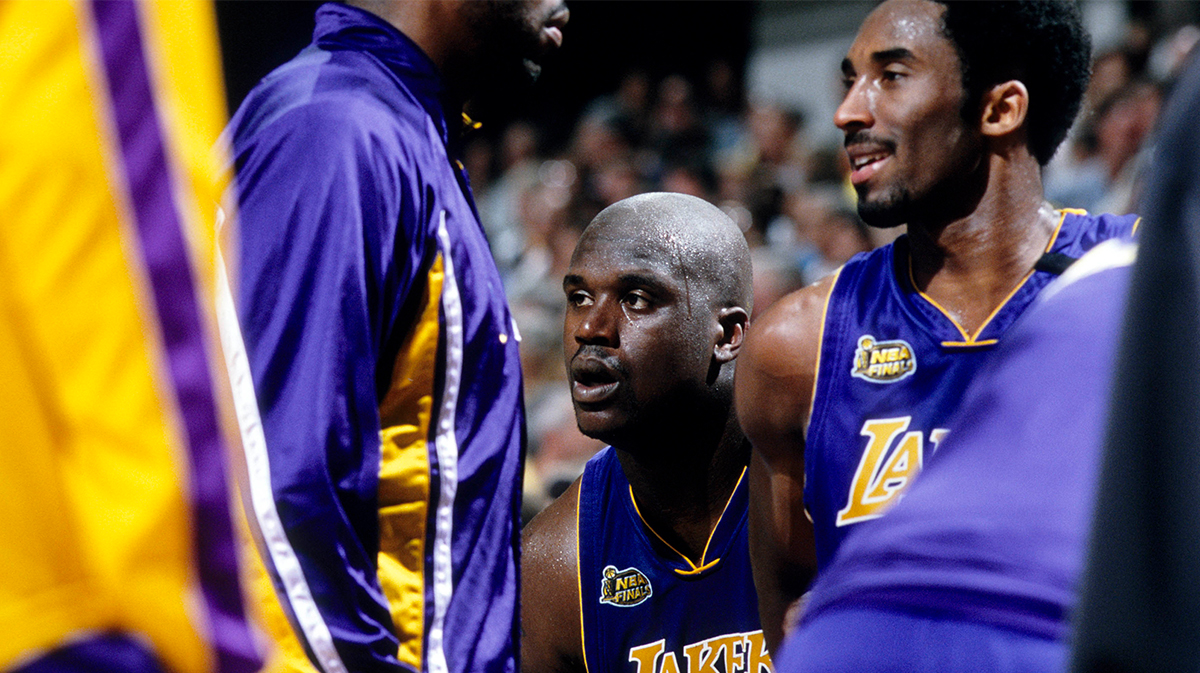 Los Angeles Lakers center Shaquille O'Neal (34) talks to guard Kobe Bryant (8) during a time-out against the Indiana Pacers during the 2000 NBA Finals at Canseco Fieldhouse.