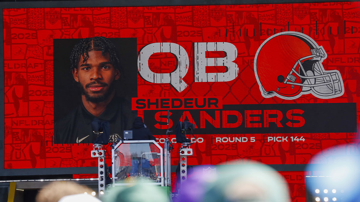 A graphic announcing Colorado quarterback Shedeur Sanders’ selection by the Cleveland Browns with the 144th overall pick is seen in the Draft Theater during the third day of the 2025 NFL Draft at Lambeau Field.