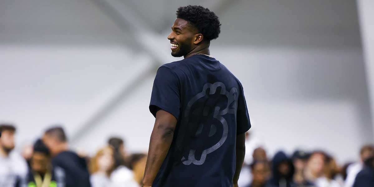 Colorado Buffaloes quarterback Shedeur Sanders (2) laughs during the University of Colorado NFL Showcase at the CU Indoor Practice Facility.