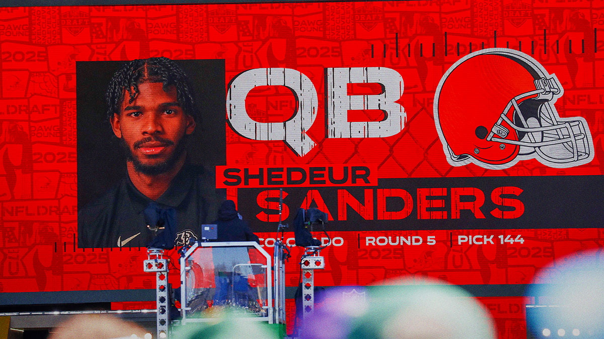 A graphic announcing Colorado quarterback Shedeur Sanders’ selection by the Cleveland Browns with the 144th overall pick is seen in the Draft Theater during the third day of the 2025 NFL Draft at Lambeau Field.
