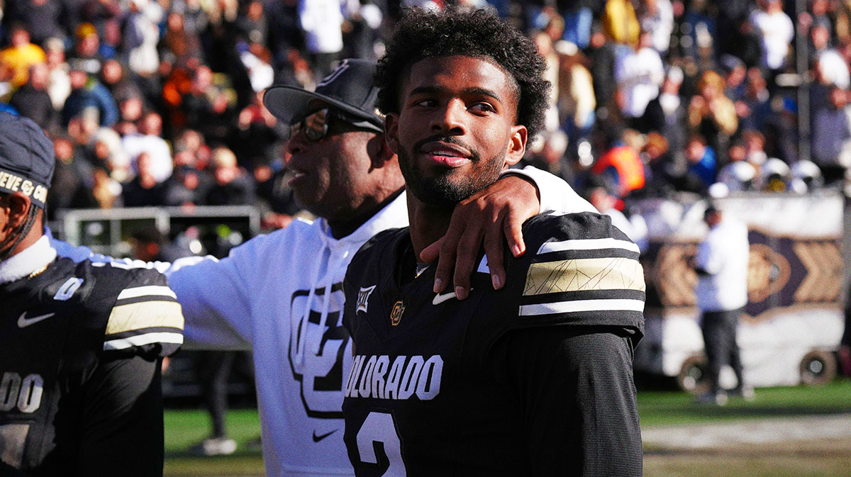 Colorado Buffaloes quarterback Shedeur Sanders (2) and head coach Deion Sanders ifollowing the win over the Oklahoma State Cowboys at Folsom Field.