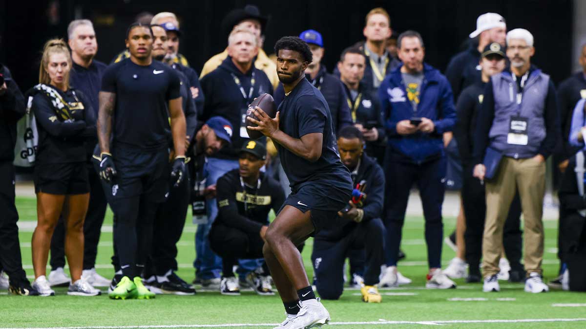 Colorado Buffaloes quarterback Shedeur Sanders (2) looks to make a pass at the University of Colorado NFL Showcase at the CU Indoor Practice Facility.