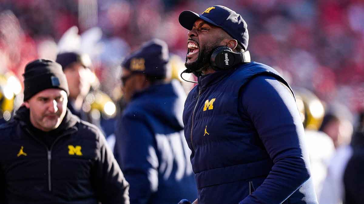 Michigan head coach Sherrone Moore celebrates a play against Ohio State during the second half at Ohio Stadium