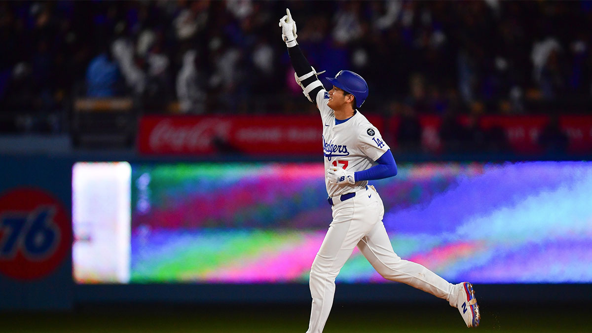 Apr 2, 2025; Los Angeles, California, USA; Los Angeles Dodgers designated hitter Shohei Ohtani (17) rounds the bases after hitting a walk off solo home run against the Atlanta Braves during the ninth inning at Dodger Stadium. Mandatory Credit: Gary A. Vasquez-Imagn Images