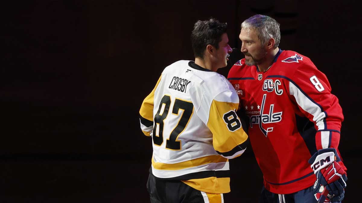 Pittsburgh Penguins center Sidney Crosby (87) and Washington Capitals left wing Alex Ovechkin (8) shake hands after a puck drop ceremony prior to their game at Capital One Arena.