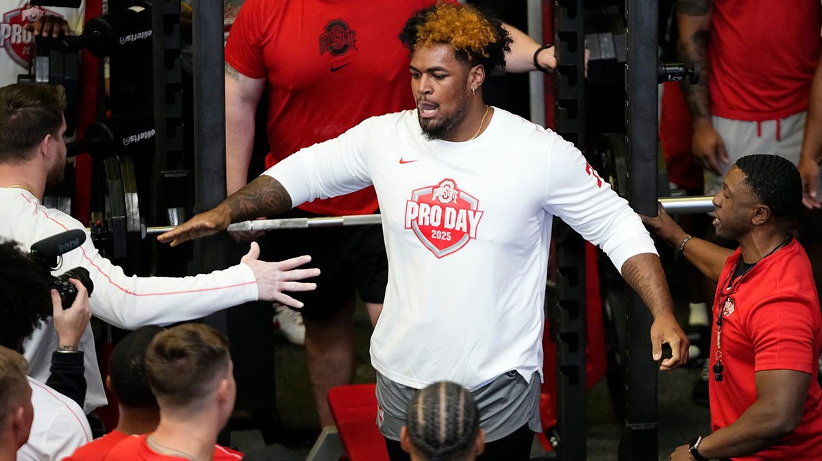 Ohio State Buckeyes offensive lineman Josh Simmons gets high fives after lifting during the pro day for NFL scouts at the Woody Hayes Athletic Cente on March 26, 2025.