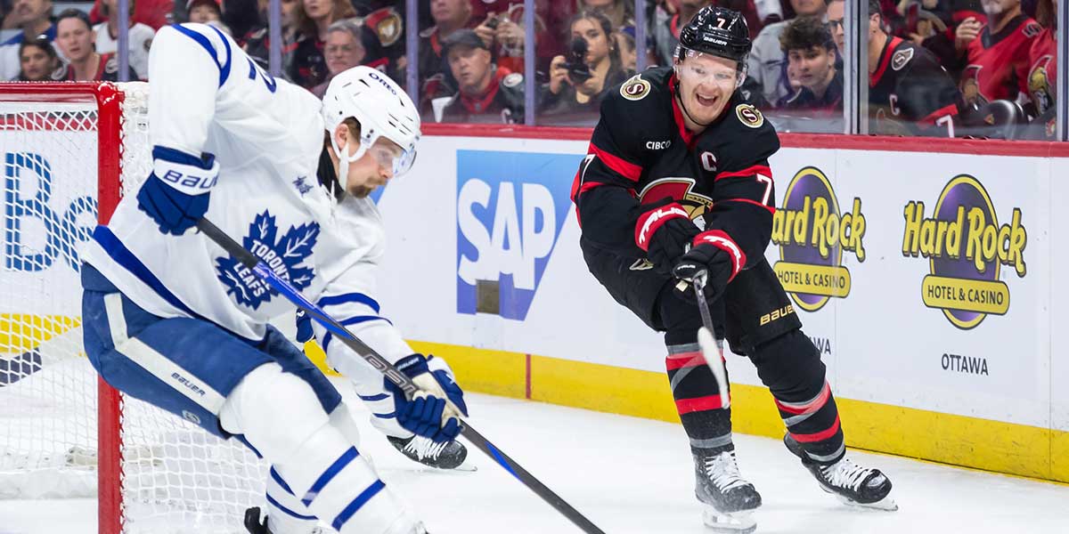 Ottawa Senators left wing Brady Tkachuk (7) shoots the puck past Toronto Maple Leafs defenseman Simon Benoit (2) in game three of the first round of the 2025 Stanley Cup Playoffs at Canadian Tire Centre.