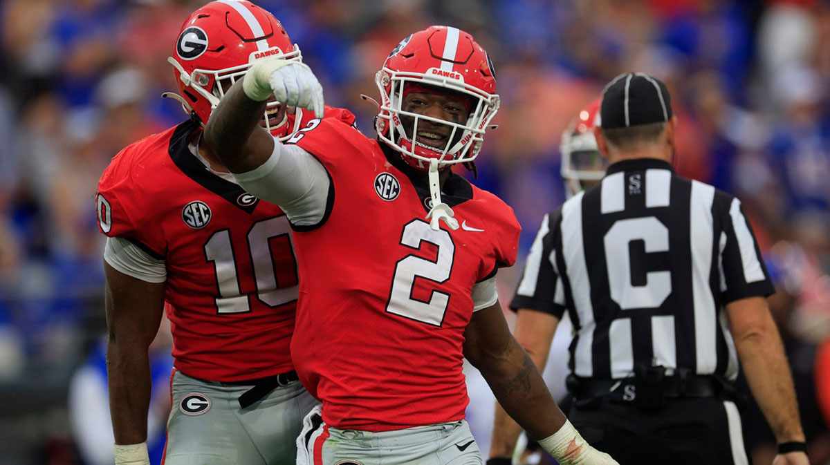 Georgia Bulldogs linebacker Smael Mondon Jr. (2) reacts to a stop as with linebacker Jamon Dumas-Johnson (10) during the second quarter of an NCAA football game Saturday, Oct. 29, 2022 at TIAA Bank Field in Jacksonville. The Georgia Bulldogs outlasted the Florida Gators 42-20.