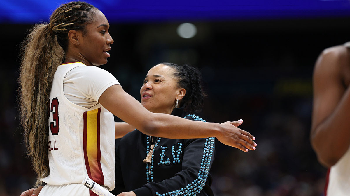 South Carolina Gamecocks head coach Dawn Staley hugs guard Bree Hall (23) during the second half of the national championship of the women's 2025 NCAA tournament at Amalie Arena.