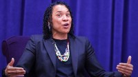 University of South Carolina women's basketball coach Dawn Staley answers a question by moderator Dan Hughes during the University of Mount Union's Schooler Lecture speaker series on April 23, 2025, in Alliance, Ohio.
