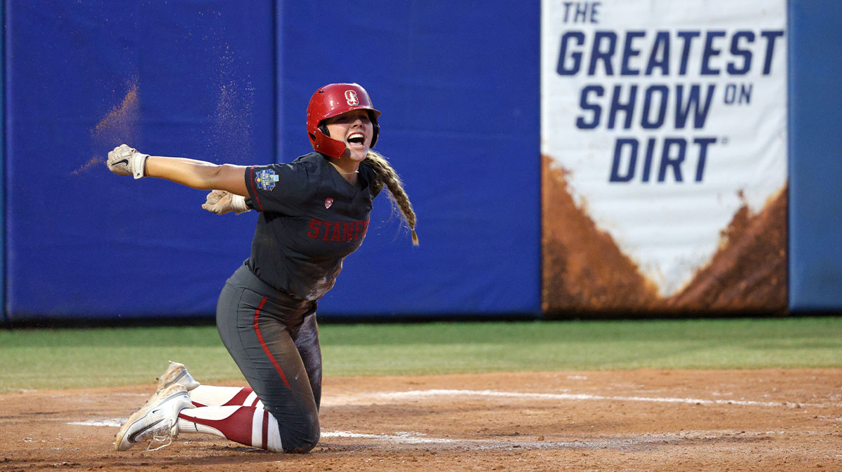 Stanford softball's Taryn Kern (99) celebrates after scoring a run in the third inning of a Women's College World Series softball game between the Stanford Cardinal and the UCLA Bruins at Devon Park in Oklahoma City, Sunday, June 2, 2024. Stanford won 3-1.