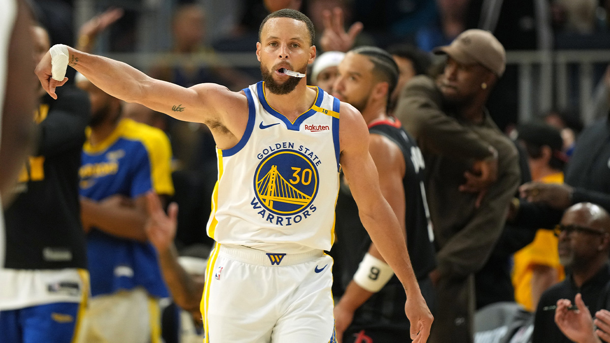 Golden State Warriors guard Stephen Curry (30) reacts after making a three point basket against the Houston Rockets during the third quarter of game three of first round for the 2024 NBA Playoffs at Chase Center.
