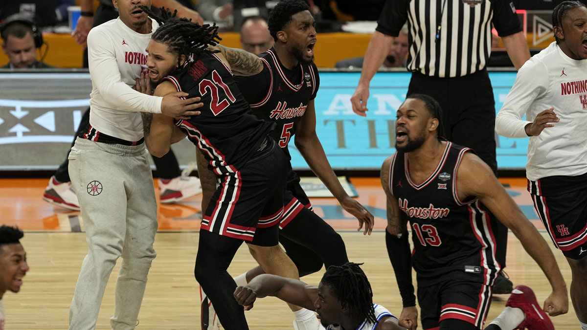 Houston Cougars guard Emanuel Sharp (21) reacts after defeating the Duke Blue Devils in the semifinals of the men's Final Four of the 2025 NCAA Tournament at Alamodome.