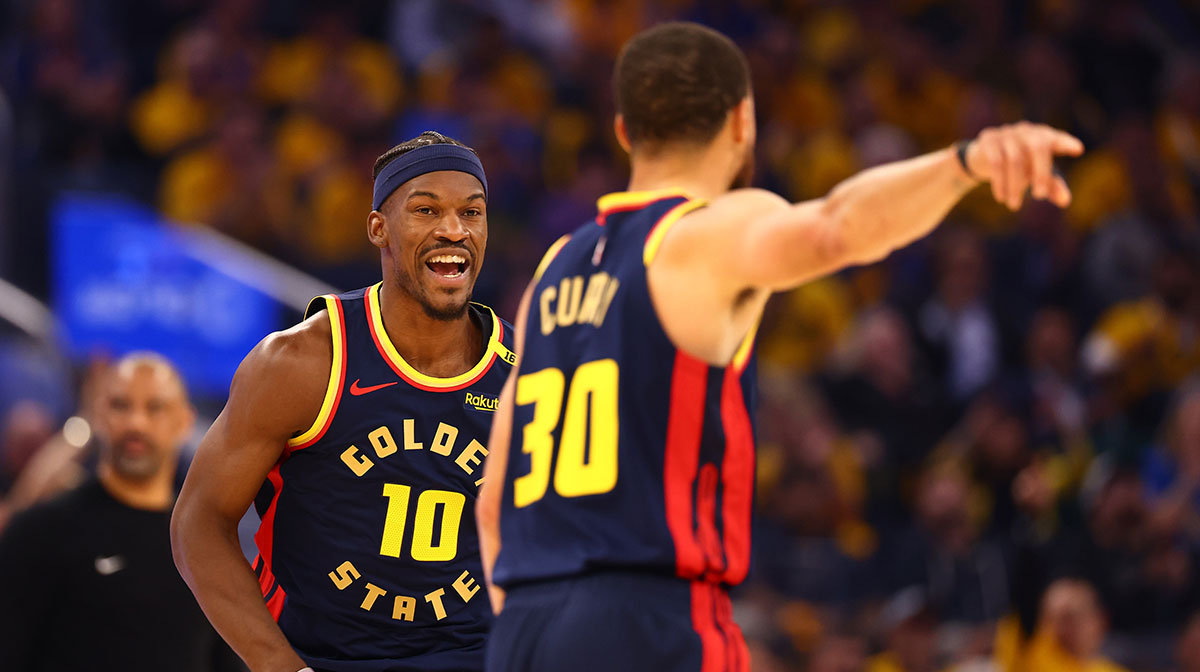 Golden State Warriors forward Jimmy Butler III (10) celebrates towards guard Stephen Curry (30) after a basket against the Houston Rockets during the first quarter of game four of the 2025 NBA Playoffs first round at Chase Center.
