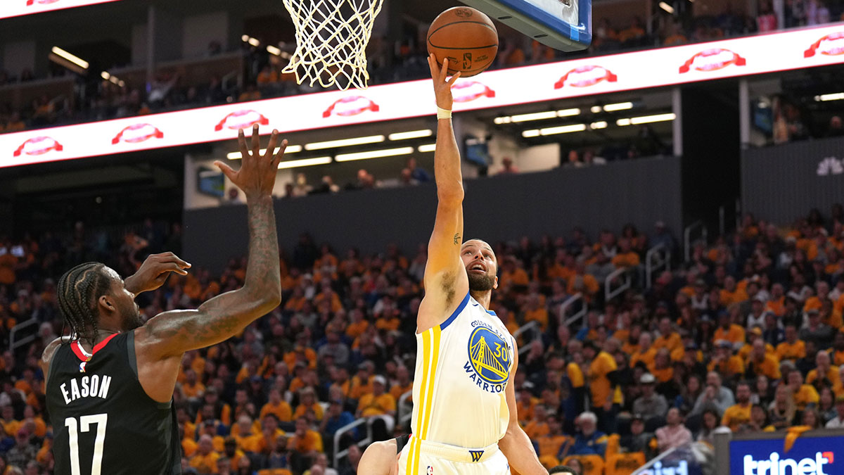 Golden State Warriors guard Stephen Curry (30) shoots against Houston Rockets forward Tari Eason (17) during the second quarter of game three of first round for the 2024 NBA Playoffs at Chase Center.