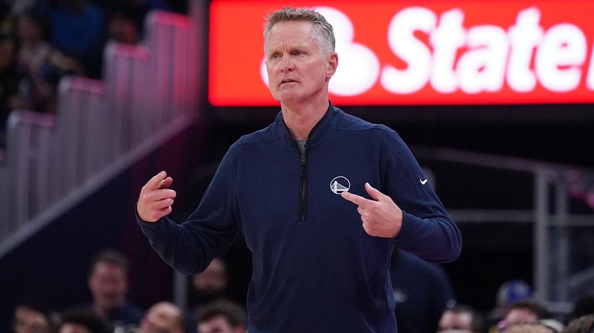 Golden State Warriors head coach Steve Kerr signals to the team during the game against the Denver Nuggets in the second period at Chase Center.