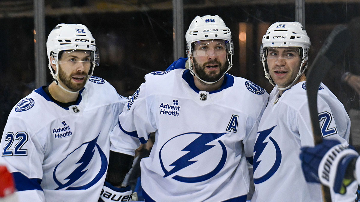 Tampa Bay Lightning center Brayden Point (21) celebrates his goal with Tampa Bay Lightning right wing Oliver Bjorkstrand (22) and Tampa Bay Lightning right wing Nikita Kucherov (86) against the New York Rangers during the first period at Madison Square Garden.