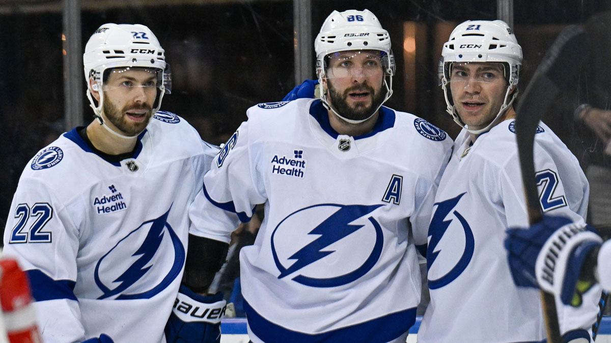 Tampa Bay Lightning center Brayden Point (21) celebrates his goal with Tampa Bay Lightning right wing Oliver Bjorkstrand (22) and Tampa Bay Lightning right wing Nikita Kucherov (86) against the New York Rangers during the first period at Madison Square Garden.