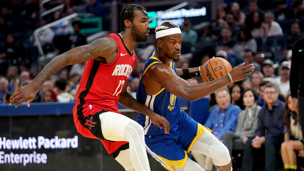 Golden State Warriors forward Jimmy Butler III (10) drives past Houston Rockets forward Tari Eason (17) in the second quarter at the Chase Center.