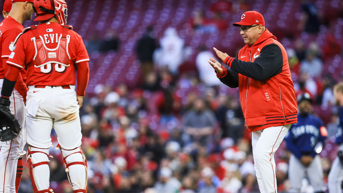 Cincinnati Reds manager Terry Francona (77) steps up to the mound during a pitching change in the fifth inning against the Seattle Mariners at Great American Ball Park.