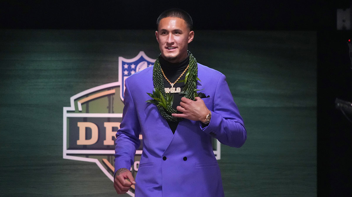 Arizona Wildcats wide receiver Tetairoa McMillan is selected by the Carolina Panthers as the number eight pick in the first round of the 2025 NFL Draft at Lambeau Field.