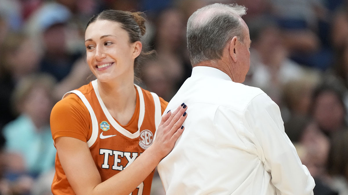 Texas Longhorns guard Shay Holle (10) and head coach Vic Schaefer during the semifinal of the women's 2025 NCAA tournament against the South Carolina Gamecocks at Amalie Arena.