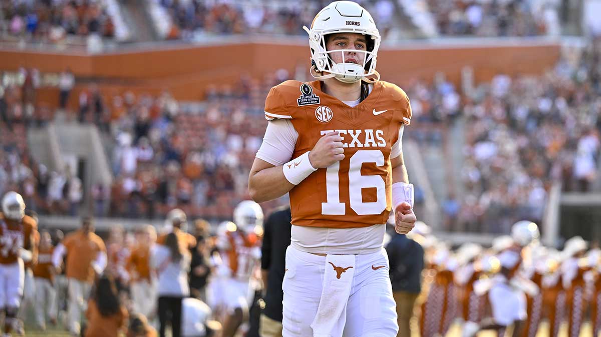 Texas Longhorns quarterback Arch Manning (16) takes the field before the game between the Texas Longhorns and the Clemson Tigers in the CFP National Playoff First Round at Darrell K Royal-Texas Memorial Stadium.