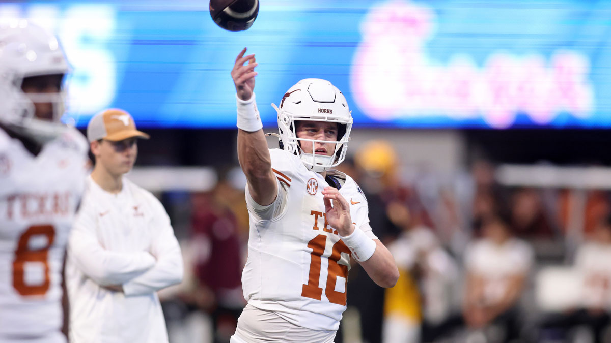 Texas Longhorns quarterback Arch Manning (16) warms up before the Peach Bowl at Mercedes-Benz Stadium.