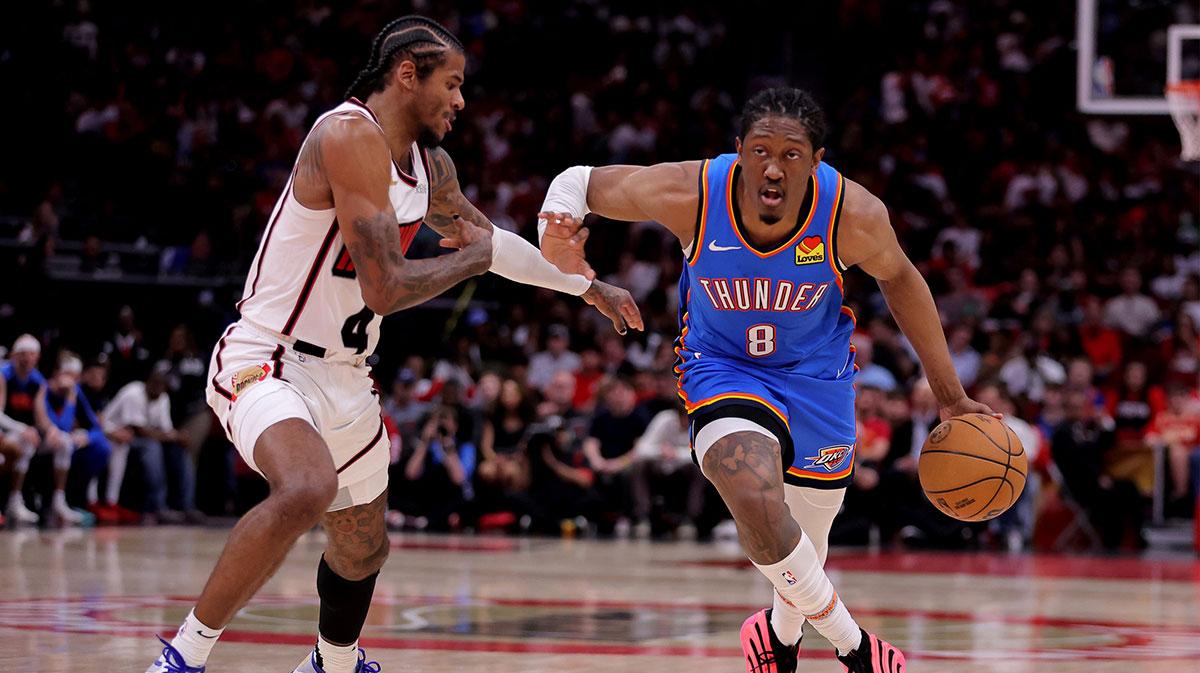 Thunder forward Jalen Williams (8) drives to the basket against Houston Rockets guard Jalen Green (4) during the third quarter at Toyota Center