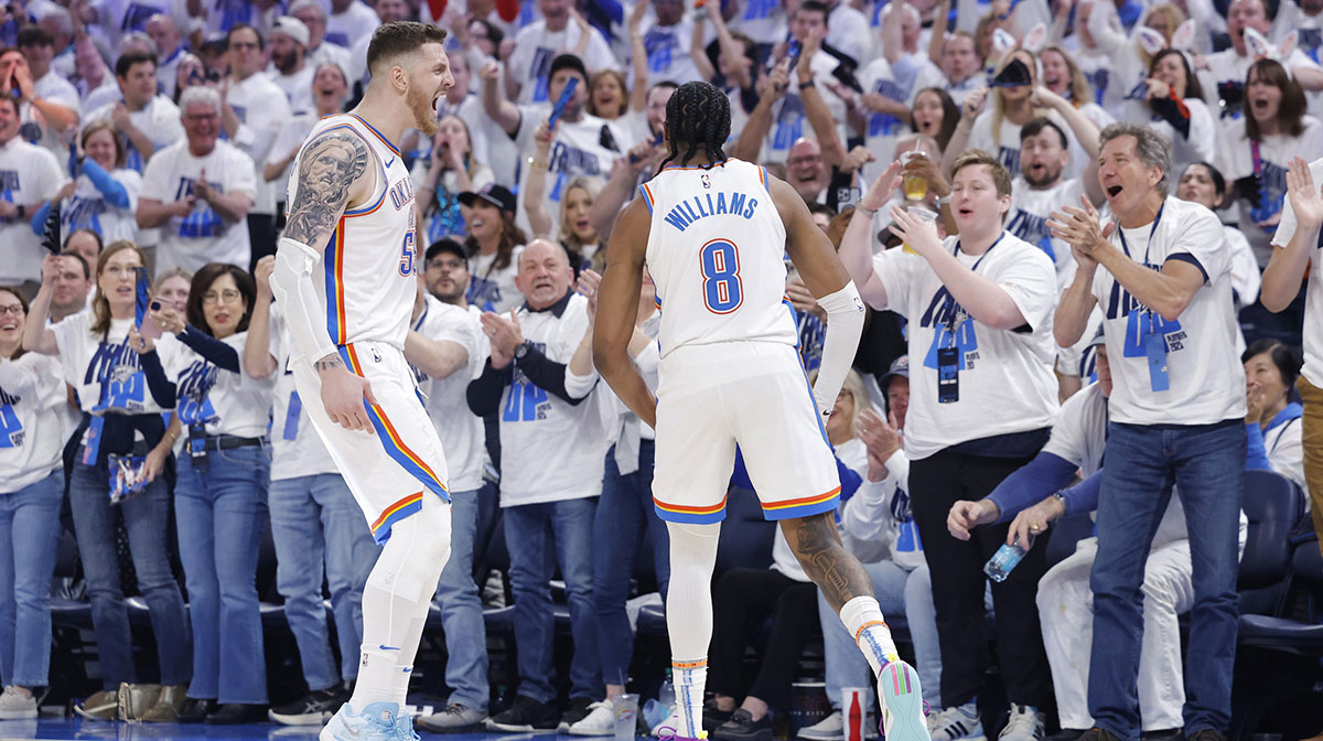 Thunder center Isaiah Hartenstein (55) and forward Jalen Williams (8) celebrate against the Memphis Grizzlies during the second quarter at Paycom Center