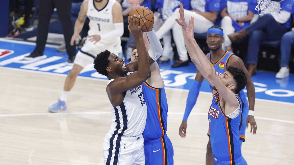 Thunder center Isaiah Hartenstein (55) and forward Chet Holmgren (7) defend the shot in the first quarter during game two of first round for the 2024 NBA Playoffs at Paycom Center