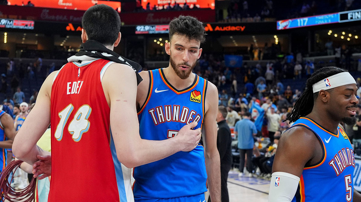 Thunder's Chet Holmgren (7) greet each other after the Thunder defeated the Grizzlies 117-115 in Game 4 to win the first-round NBA playoff series at FedExForum