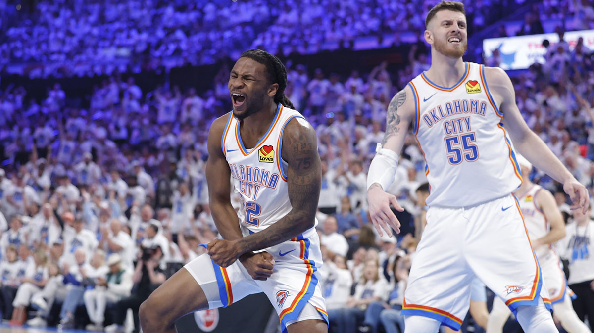 Thunder guard Cason Wallace (22) celebrates after scoring against the Memphis Grizzlies during the second quarter at Paycom Center
