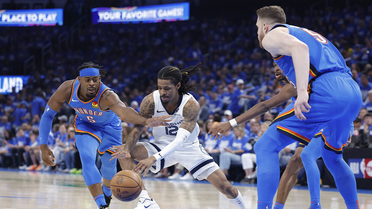 Thunder guard Luguentz Dort (5) reach for a loose ball in the third quarter during game two of first round for the 2024 NBA Playoffs at Paycom Center