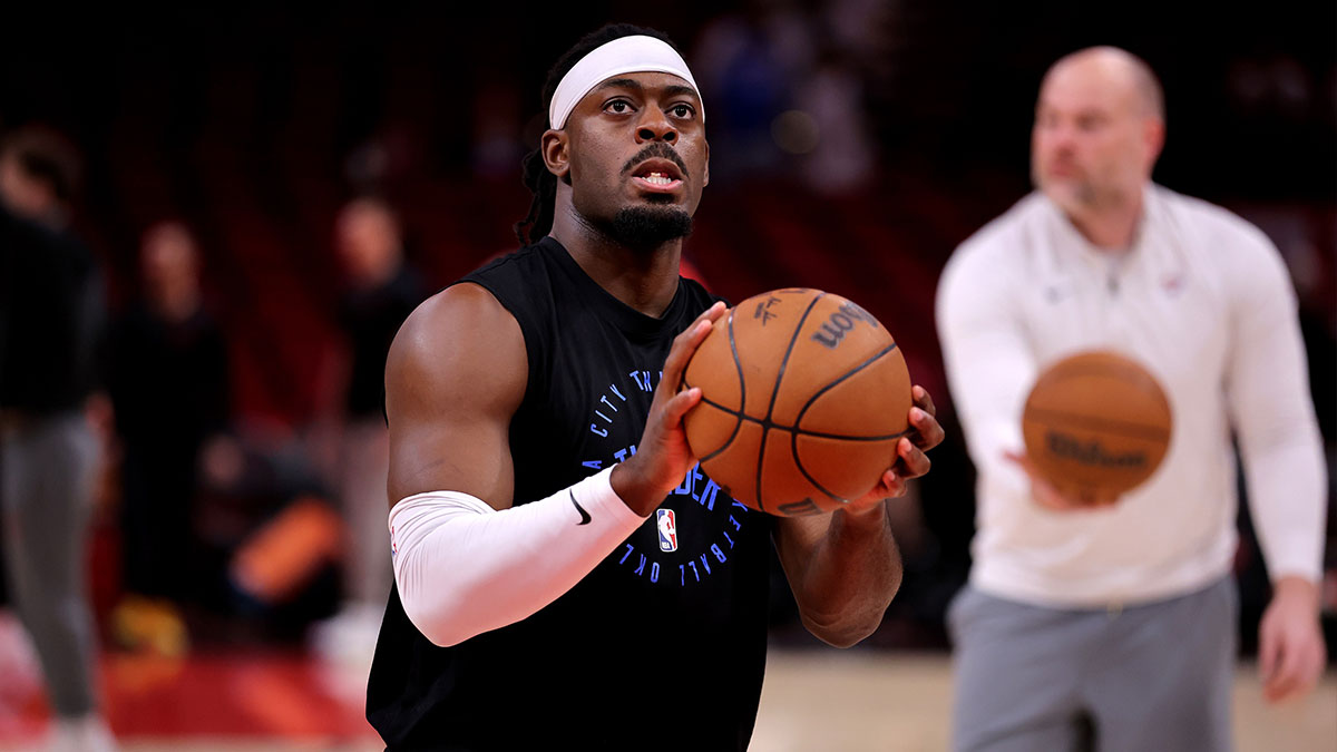 Thunder guard Luguentz Dort (5) warms up prior to the game against the Houston Rockets at Toyota Center