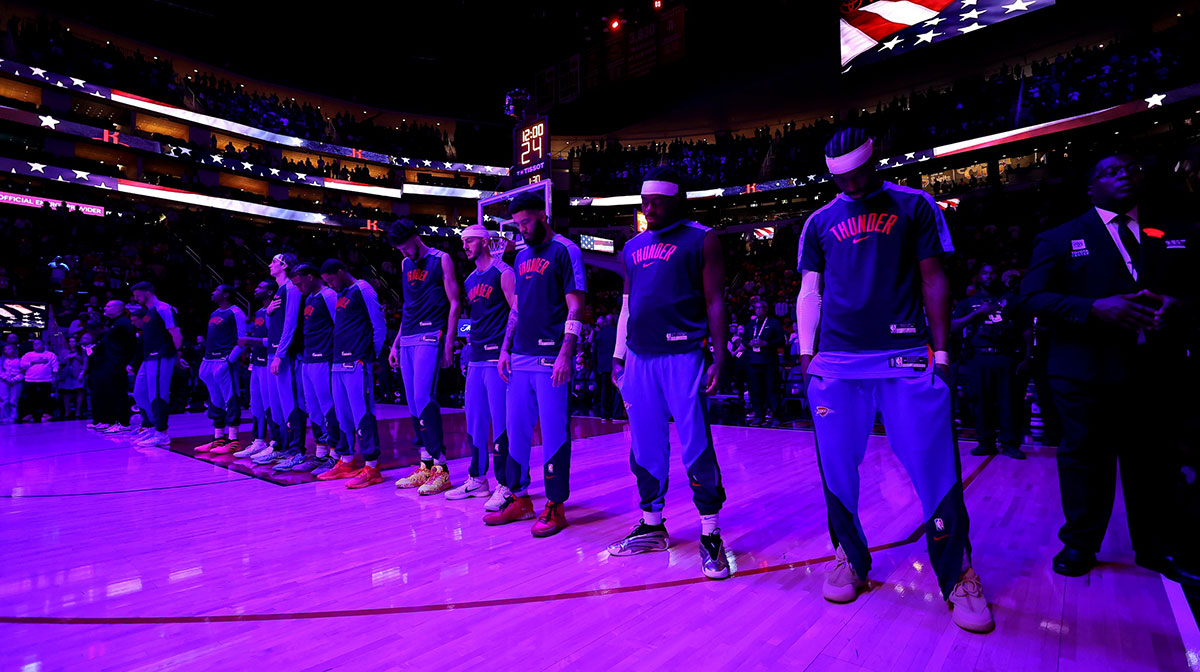 Oklahoma City Thunder stand during the national anthem prior to the game against the Houston Rockets at Toyota Center.