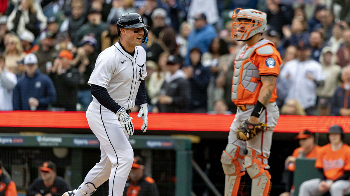 Detroit Tigers first base Spencer Torkelson (20) touches home plate after hitting a solo home run against Baltimore Orioles pitcher Matt Bowman (51) in the seventh inning during game one of a double header at Comerica Park.
