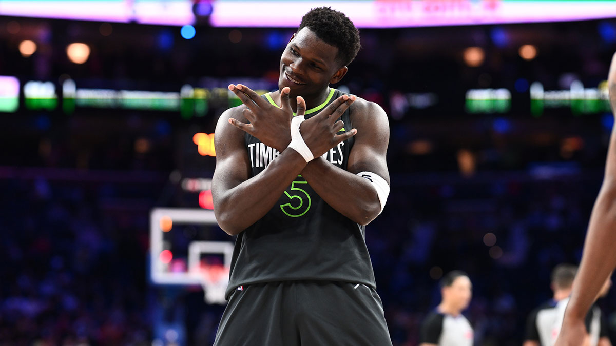 Minnesota Timberwolves guard Anthony Edwards (5) reacts after scoring against the Philadelphia 76ers in the fourth quarter at Wells Fargo Center.
