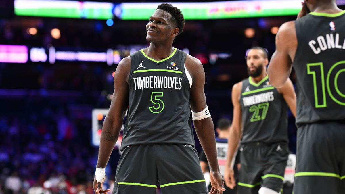 Minnesota Timberwolves guard Anthony Edwards (5) reacts after scoring against the Philadelphia 76ers in the fourth quarter at Wells Fargo Center.