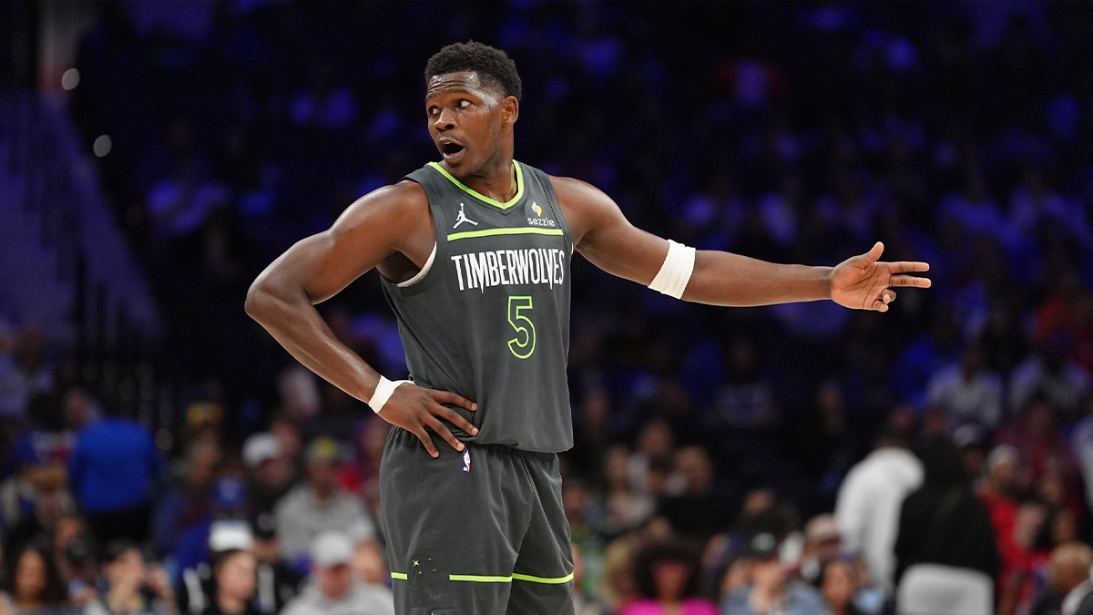 Minnesota Timberwolves guard Anthony Edwards (5) reacts against the Philadelphia 76ers in the first quarter at Wells Fargo Center.