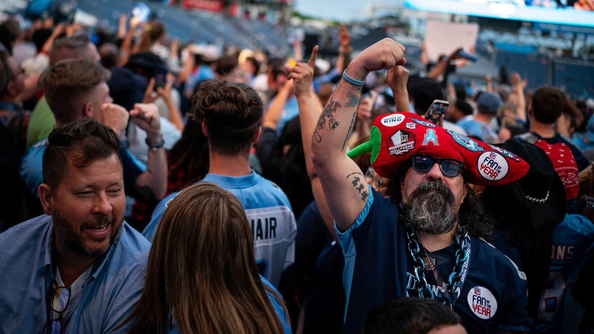 Fernando Espejo, aka Chilly Pepper, cheers as during the Tennessee Titans select Miami Hurricanes quarterback Cam Ward with the first overall pick during the Titans NFL Draft Watch Party