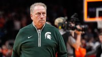 Michigan State head coach Tom Izzo exits the court after 70-64 loss to Auburn at the Elite Eight round of NCAA tournament