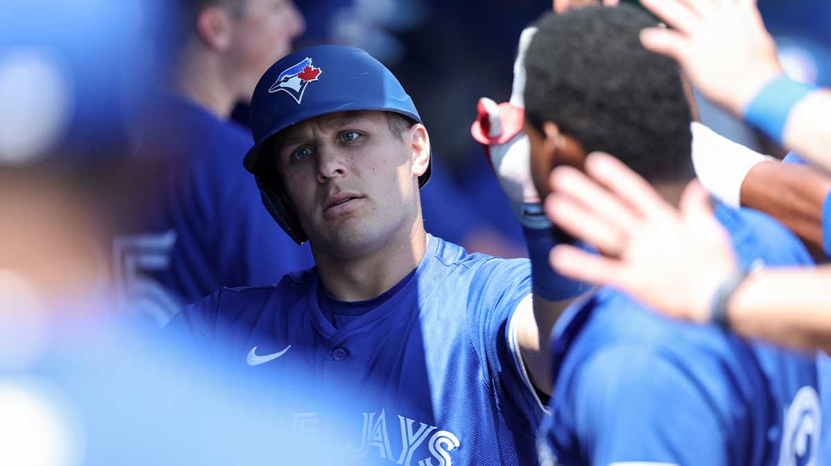 Toronto Blue Jays outfielder Daulton Varsho (5) celebrates after hitting a two run home run against the Baltimore Orioles in the fifth inning during spring training at TD Ballpark.