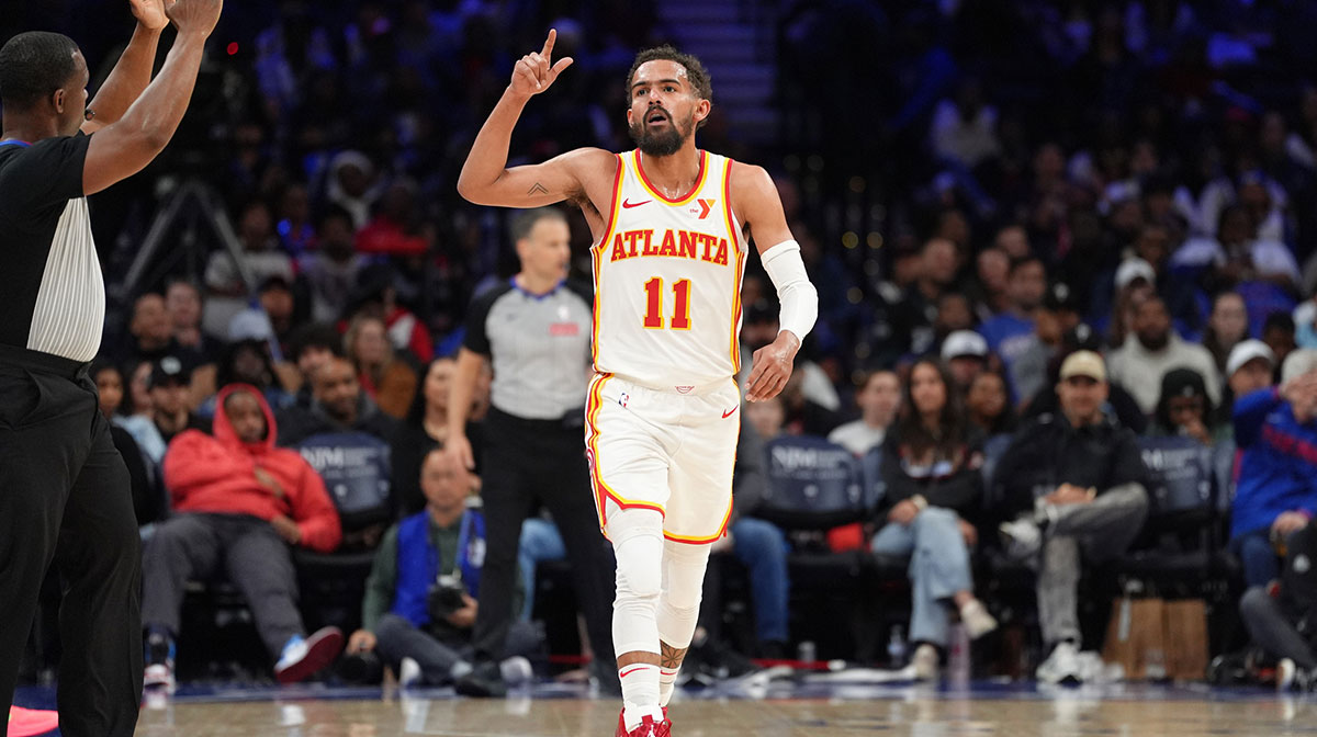Atlanta Hawks guard Trae Young (11) reacts after scoring against the Philadelphia 76ers in the fourth quarter at Wells Fargo Center.