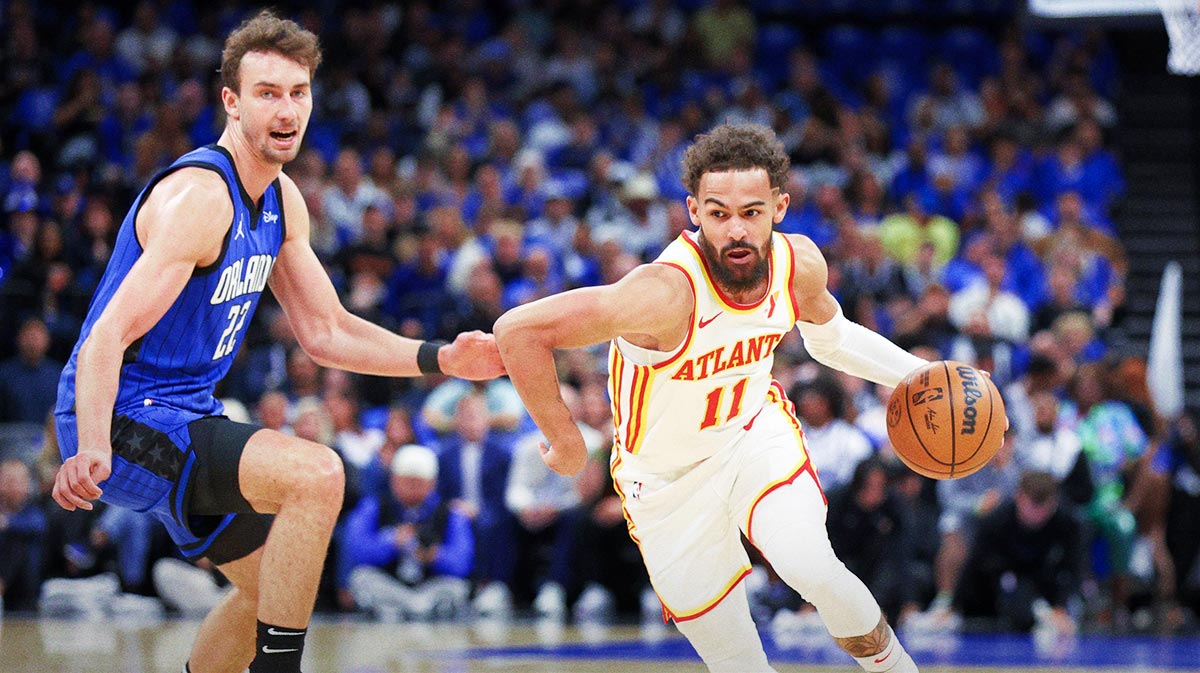 Atlanta Hawks guard Trae Young (11) controls the ball against the Orlando Magic in the first quarter at Kia Center.