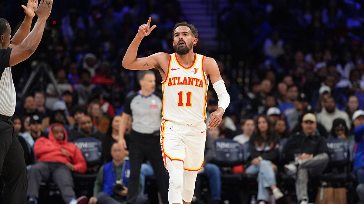 Atlanta Hawks guard Trae Young (11) reacts after scoring against the Philadelphia 76ers in the fourth quarter at Wells Fargo Center.