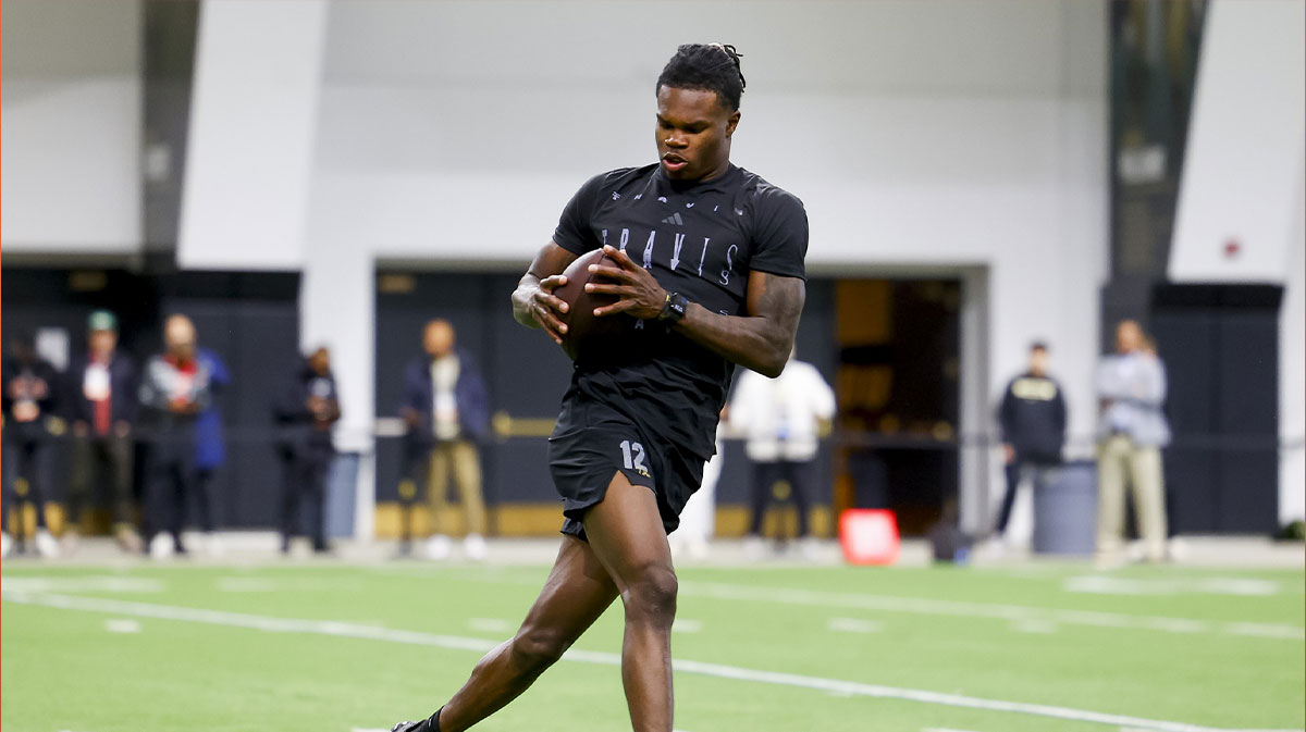 Colorado Buffaloes wide receiver Travis Hunter (12) catches a pass at the University of Colorado NFL Showcase at the CU Indoor Practice Facility.