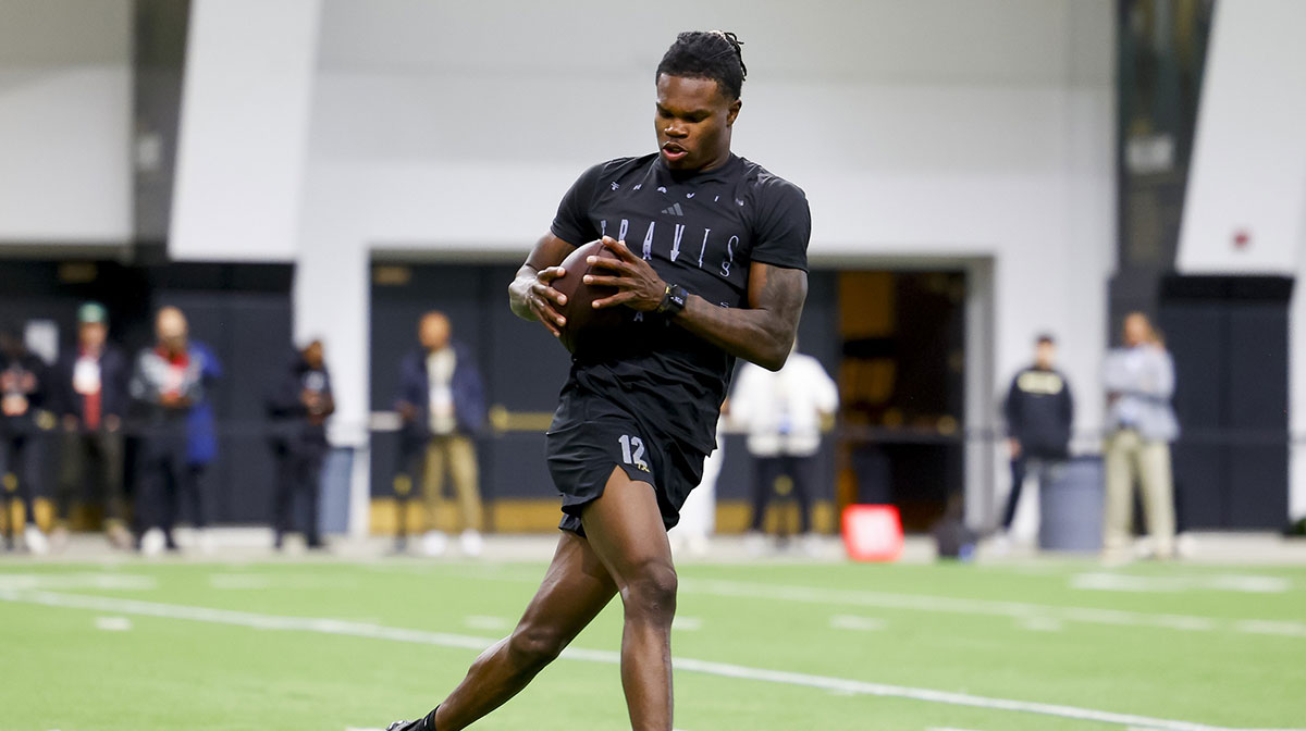 Colorado Buffaloes wide receiver Travis Hunter (12) catches a pass at the University of Colorado NFL Showcase at the CU Indoor Practice Facility.
