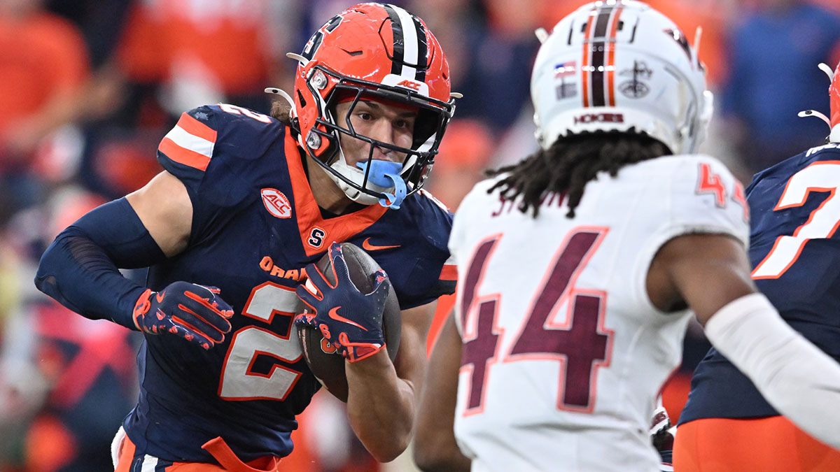 Syracuse Orange wide receiver Trebor Pena (2) tries to avoid a tackle by Virginia Tech Hokies cornerback Dorian Strong (44) in the third quarter at JMA Wireless Dome.