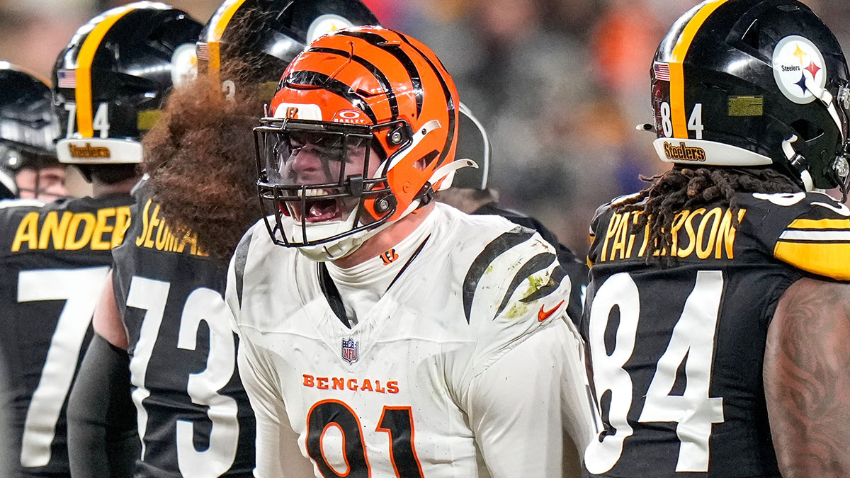 Cincinnati Bengals defensive end Trey Hendrickson (91) celebrates a stop in the fourth quarter of the NFL Week 18 game between the Pittsburgh Steelers and the Cincinnati Bengals at Acrisure Stadium in Pittsburgh on Saturday, Jan. 4, 2025. The Bengals won 19-17 to finish the regular season at 9-8.